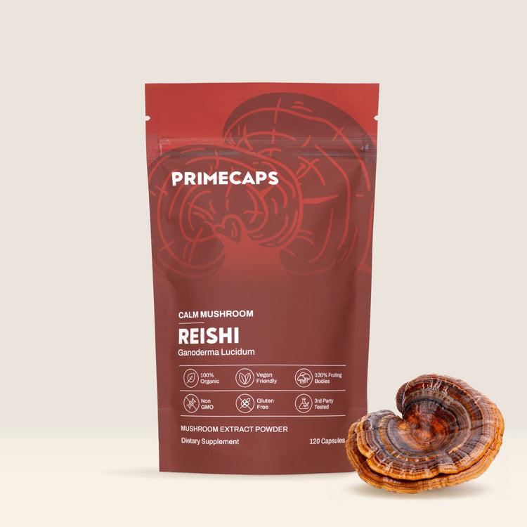 PRIMECAPS Reishi stand-up pouch with a whole Reishi mushroom positioned beside the packaging.